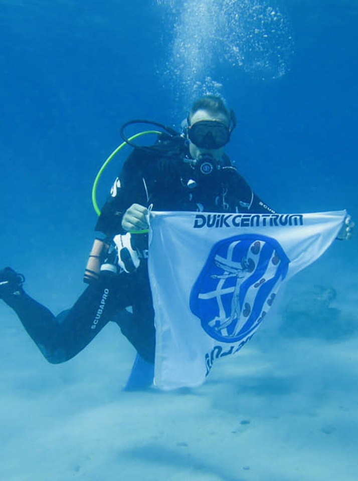 our team diving in curacao corinda shirt
