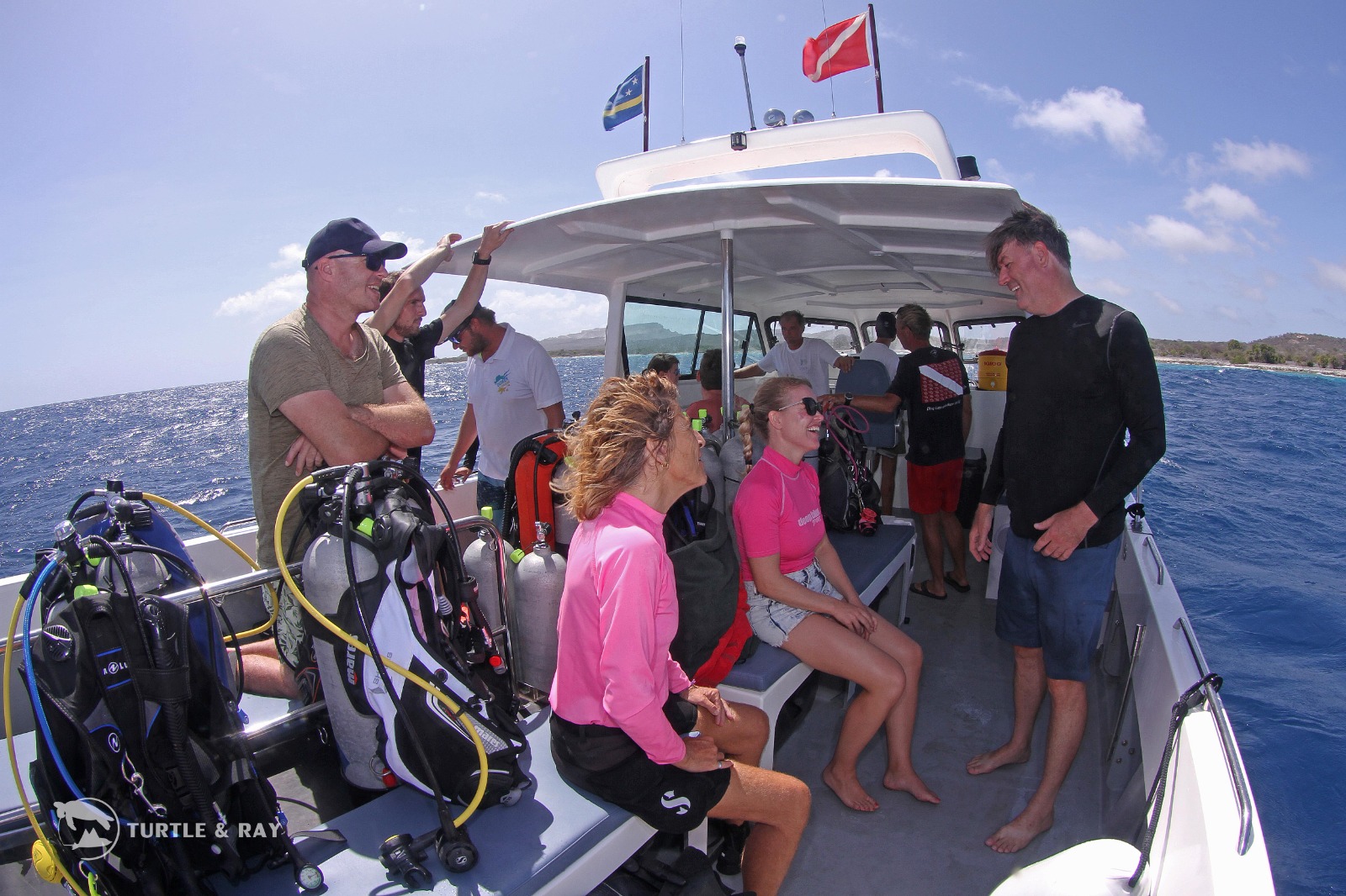 boat dive divers on a dive boat waiting to get into the water